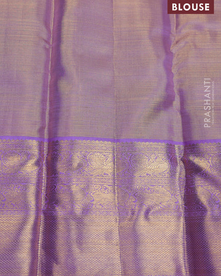 Pure kanchipuram silk saree gold and lavender with allover zari woven brocade weaves and zari woven korvai border