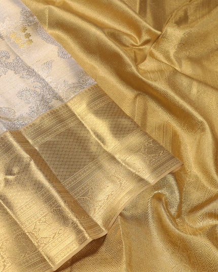 Pure kanchipuram silk saree gold and sandal with allover zari woven brocade weaves and zari woven korvai border