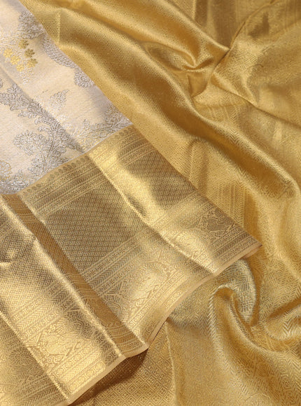 Pure kanchipuram silk saree gold and sandal with allover zari woven brocade weaves and zari woven korvai border