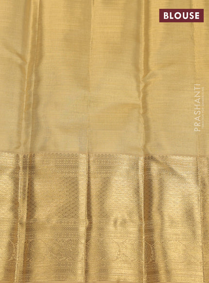 Pure kanchipuram silk saree gold and sandal with allover zari woven brocade weaves and zari woven korvai border