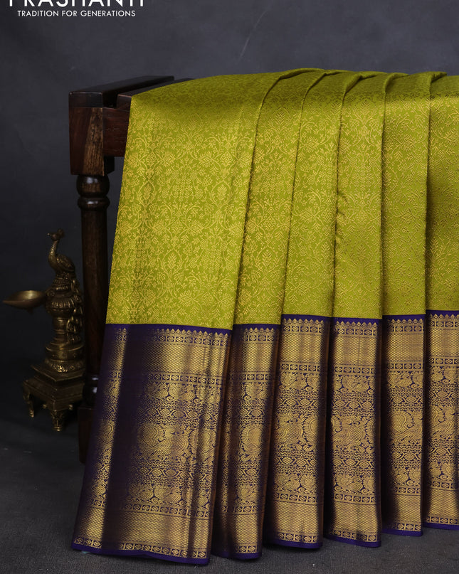 Pure kanchipuram silk saree lime green and navy blue with allover zari woven brocade weaves and long zari woven border