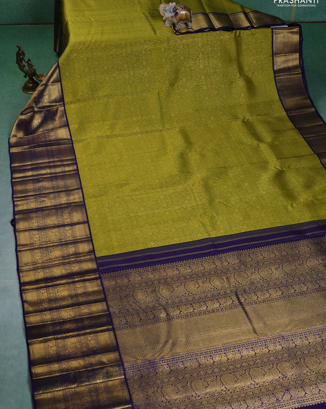 Pure kanchipuram silk saree lime green and navy blue with allover zari woven brocade weaves and long zari woven border