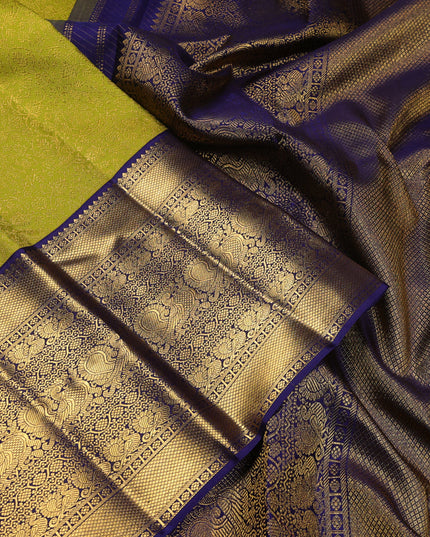 Pure kanchipuram silk saree lime green and navy blue with allover zari woven brocade weaves and long zari woven border