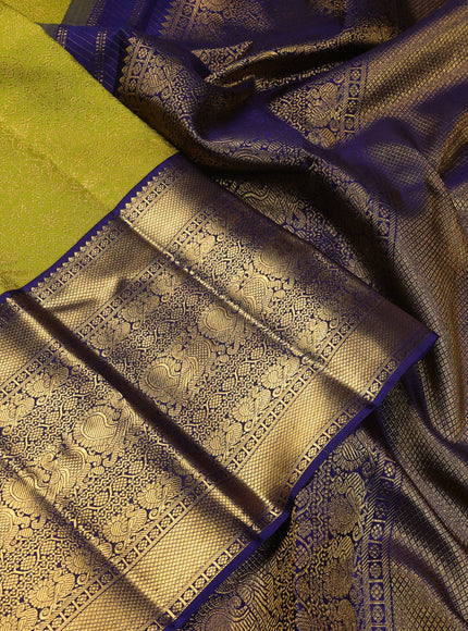 Pure kanchipuram silk saree lime green and navy blue with allover zari woven brocade weaves and long zari woven border