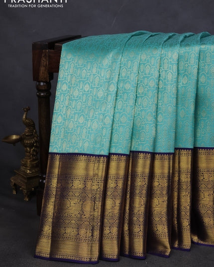 Pure kanchipuram silk saree teal blue and navy blue with allover zari woven brocade weaves and long zari woven border