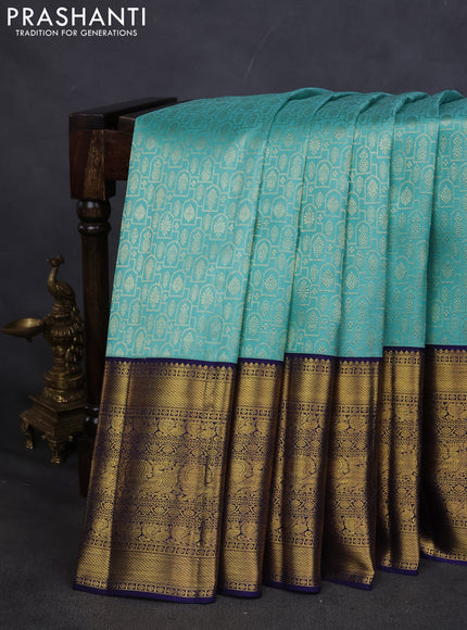 Pure kanchipuram silk saree teal blue and navy blue with allover zari woven brocade weaves and long zari woven border