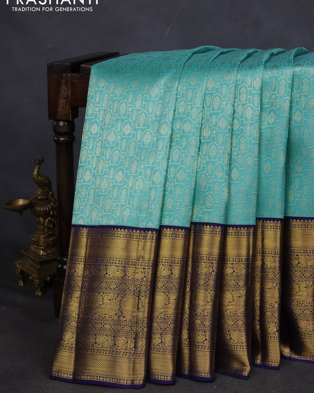 Pure kanchipuram silk saree teal blue and navy blue with allover zari woven brocade weaves and long zari woven border