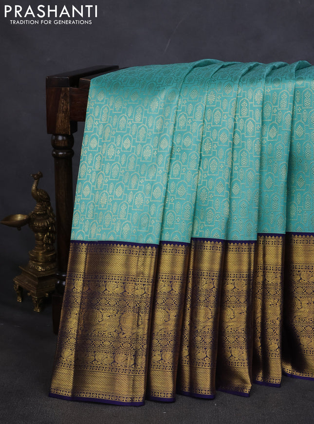 Pure kanchipuram silk saree teal blue and navy blue with allover zari woven brocade weaves and long zari woven border
