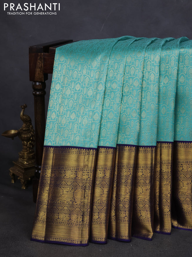 Pure kanchipuram silk saree teal blue and navy blue with allover zari woven brocade weaves and long zari woven border