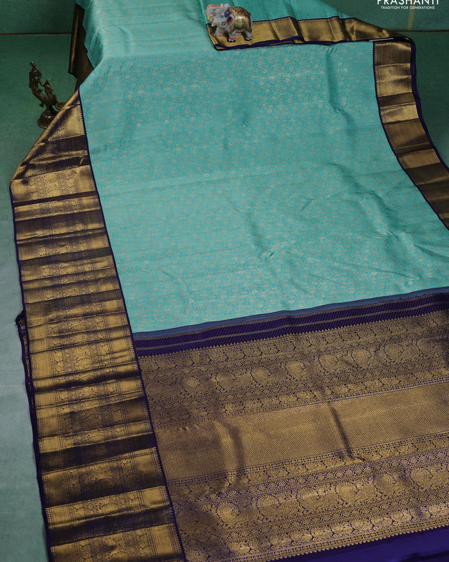 Pure kanchipuram silk saree teal blue and navy blue with allover zari woven brocade weaves and long zari woven border