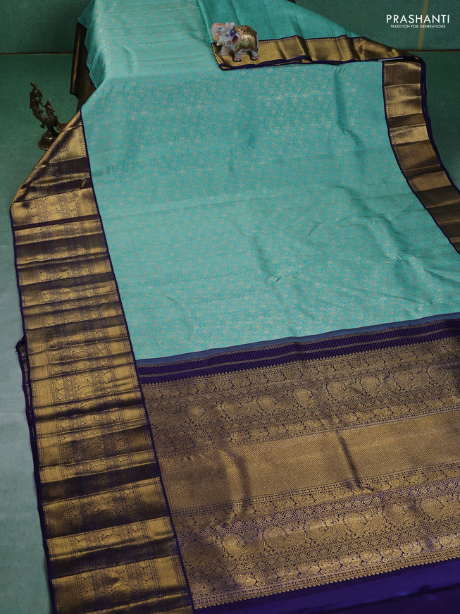 Pure kanchipuram silk saree teal blue and navy blue with allover zari woven brocade weaves and long zari woven border