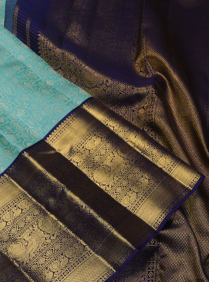 Pure kanchipuram silk saree teal blue and navy blue with allover zari woven brocade weaves and long zari woven border
