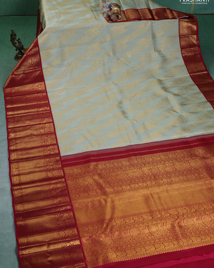 Pure kanchipuram silk saree pista green and maroon with allover zari woven brocade weaves and long zari woven border