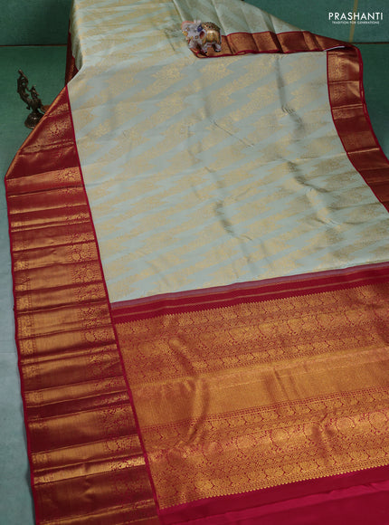 Pure kanchipuram silk saree pista green and maroon with allover zari woven brocade weaves and long zari woven border