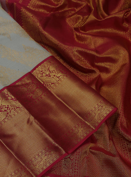 Pure kanchipuram silk saree pista green and maroon with allover zari woven brocade weaves and long zari woven border