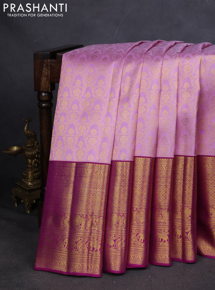 Pure kanchipuram silk saree lavender and purple with allover zari woven brocade weaves and long zari woven border