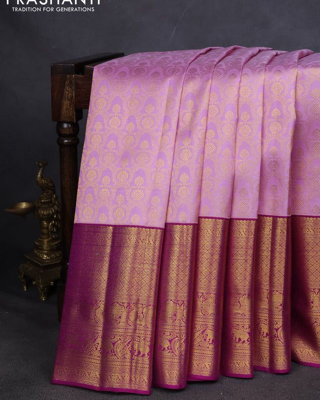 Pure kanchipuram silk saree lavender and purple with allover zari woven brocade weaves and long zari woven border