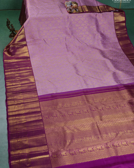 Pure kanchipuram silk saree lavender and purple with allover zari woven brocade weaves and long zari woven border