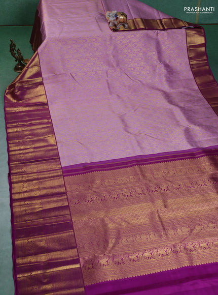 Pure kanchipuram silk saree lavender and purple with allover zari woven brocade weaves and long zari woven border