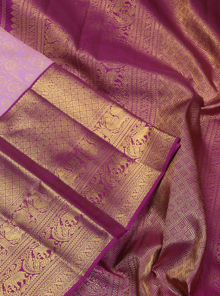 Pure kanchipuram silk saree lavender and purple with allover zari woven brocade weaves and long zari woven border