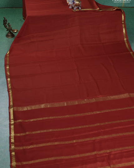 Pure mysore silk saree orange with plain body and small zari woven border