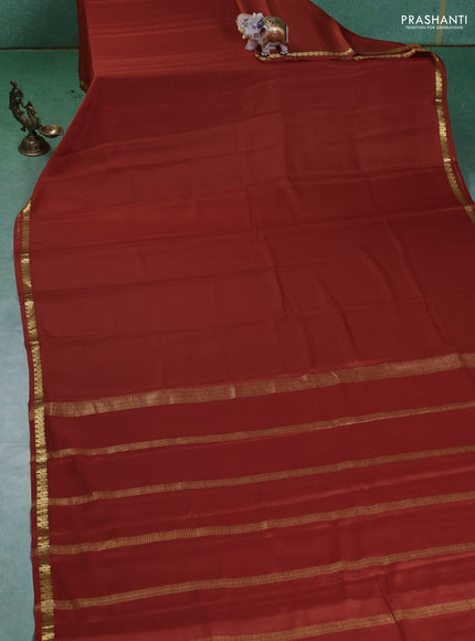 Pure mysore silk saree orange with plain body and small zari woven border