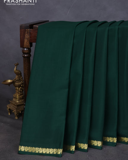 Pure mysore silk saree dark green with plain body and small zari woven border