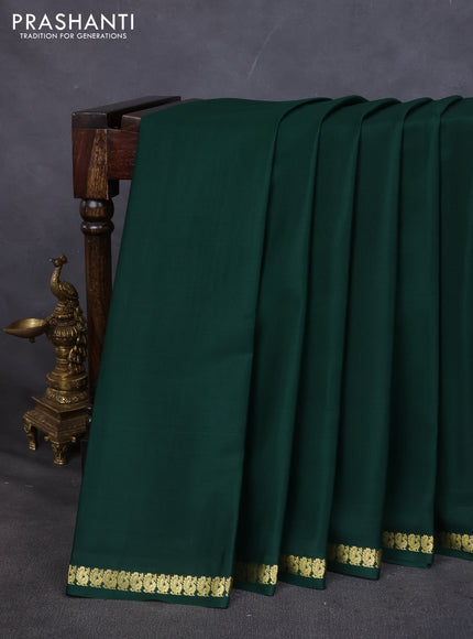 Pure mysore silk saree dark green with plain body and small zari woven border