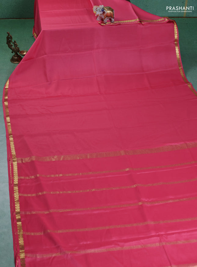 Pure mysore silk saree peach pink with plain body and small zari woven border