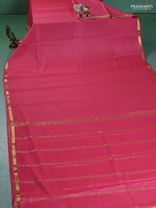 Pure mysore silk saree peach pink with plain body and small zari woven border
