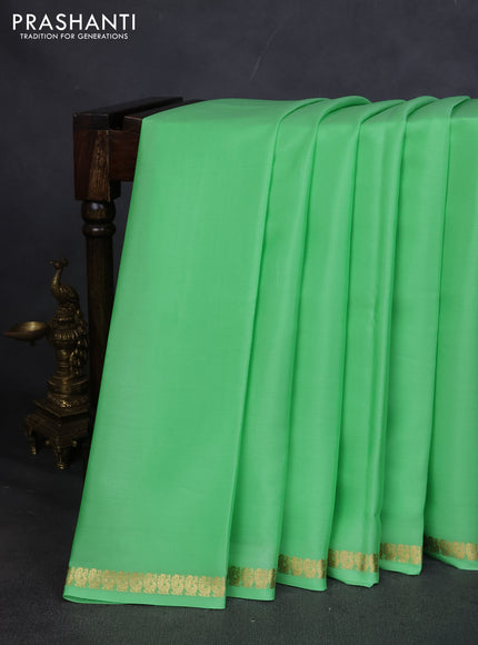 Pure mysore silk saree pista green with plain body and small zari woven border