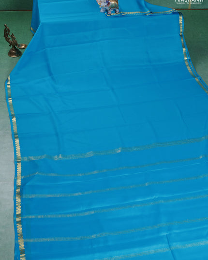 Pure mysore silk saree cs blue with plain body and small zari woven border