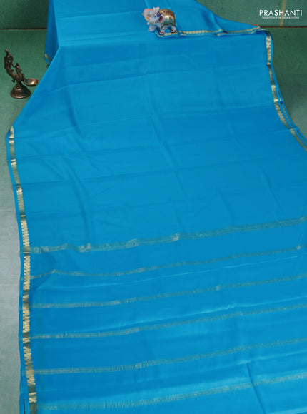Pure mysore silk saree cs blue with plain body and small zari woven border