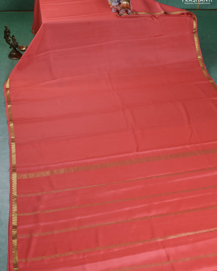 Pure mysore silk saree peach orange with plain body and small zari woven border
