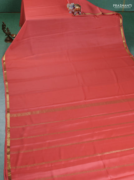Pure mysore silk saree peach orange with plain body and small zari woven border