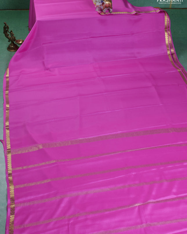 Pure mysore silk saree light pink with plain body and small zari woven border