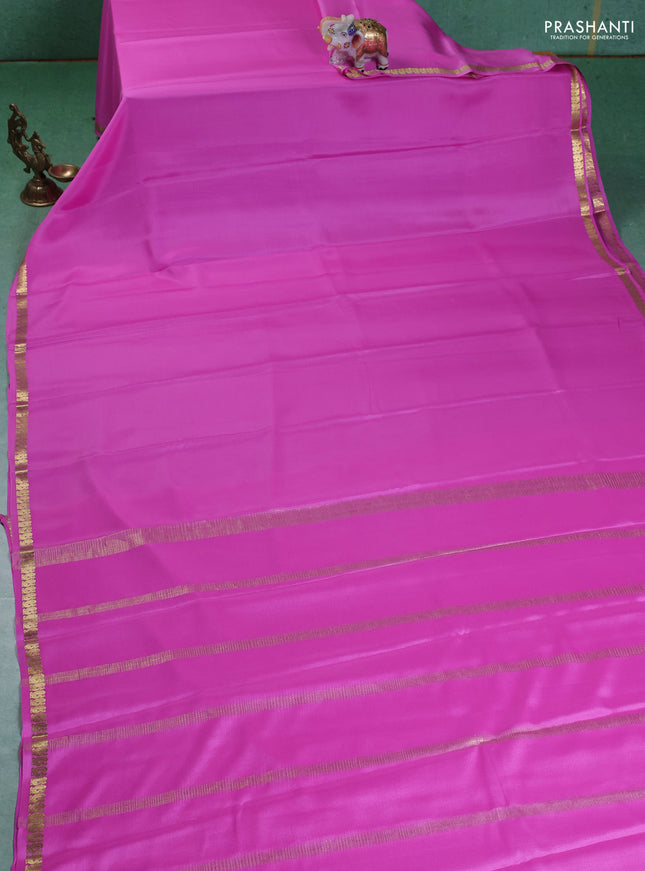 Pure mysore silk saree light pink with plain body and small zari woven border