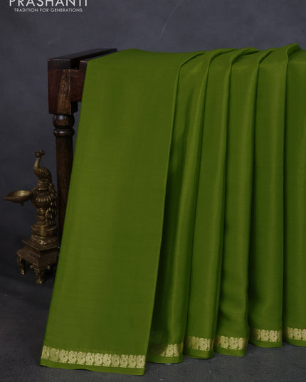 Pure mysore silk saree light green with plain body and small zari woven border