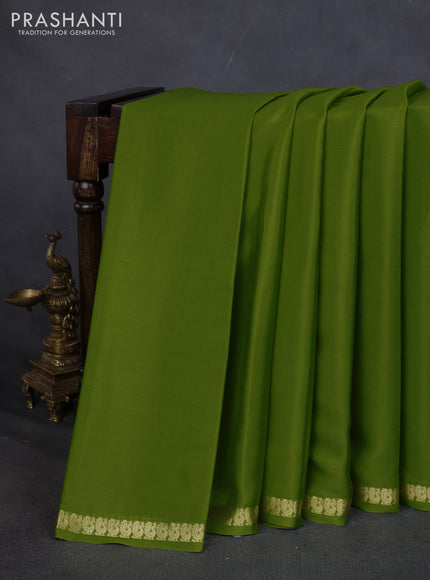 Pure mysore silk saree light green with plain body and small zari woven border