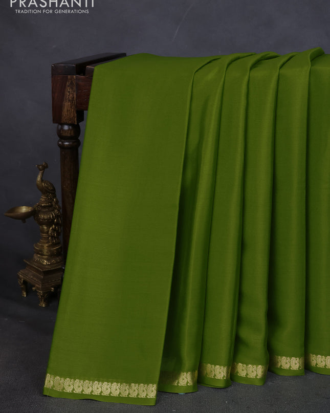 Pure mysore silk saree light green with plain body and small zari woven border