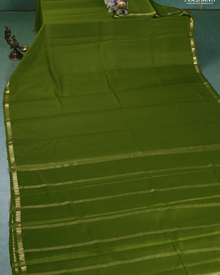 Pure mysore silk saree light green with plain body and small zari woven border