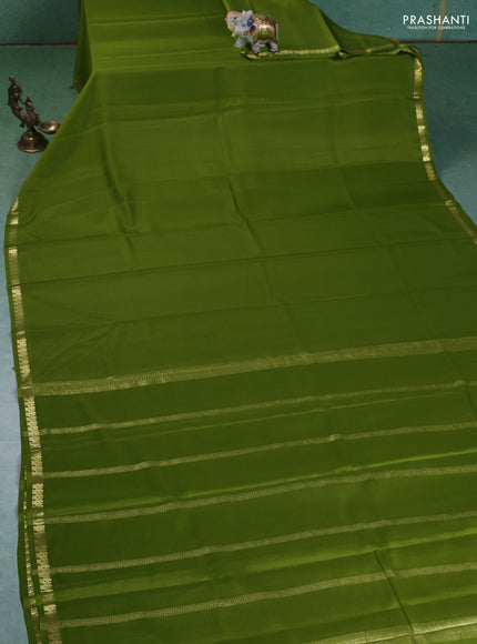 Pure mysore silk saree light green with plain body and small zari woven border