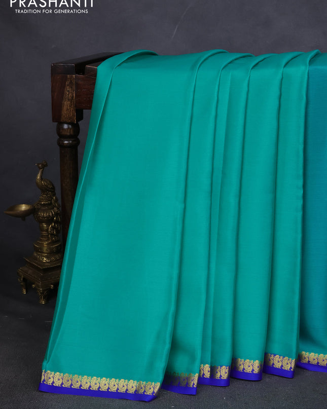 Pure mysore silk saree teal blue and blue with plain body and small zari woven border