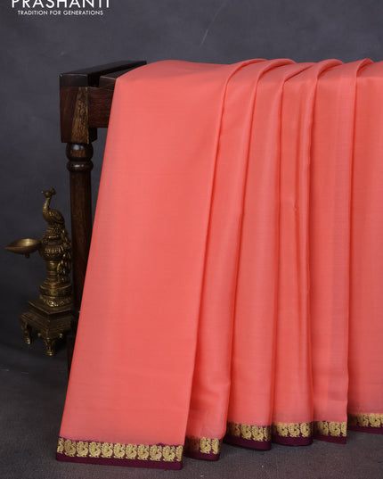 Pure mysore silk saree peach orange and wine shade with plain body and small zari woven border