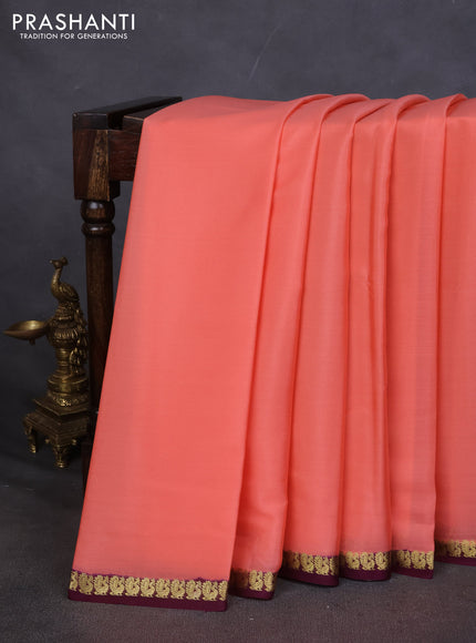Pure mysore silk saree peach orange and wine shade with plain body and small zari woven border