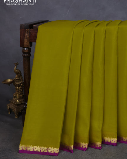 Pure mysore silk saree lime yellow and purple with plain body and small zari woven border