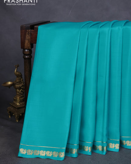 Pure mysore silk saree teal blue with plain body and small zari woven border