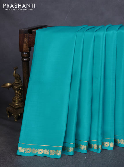 Pure mysore silk saree teal blue with plain body and small zari woven border