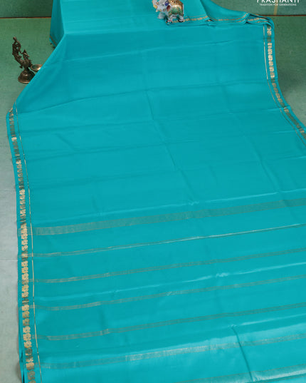 Pure mysore silk saree teal blue with plain body and small zari woven border