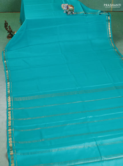 Pure mysore silk saree teal blue with plain body and small zari woven border